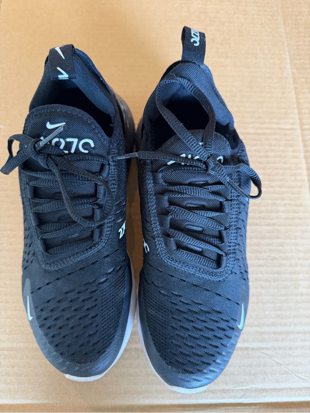 Women’s 6.5 
Nike Black Athletic Sneakers with White Swoosh